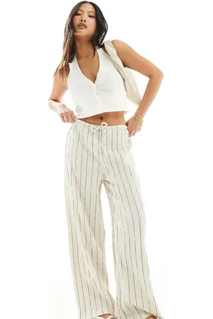 Stradivarius Petite crinkle pull on trouser in stripe