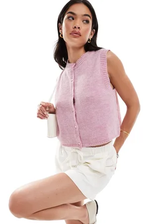 ASOS Fluffy knit waistcoat in light