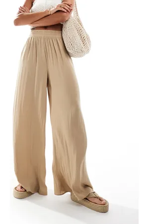 MANGO Soft touch wide leg trousers in beige