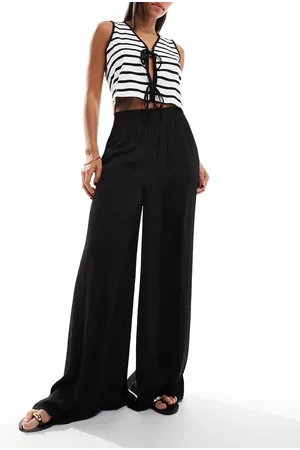 MANGO Soft touch wide leg trousers in