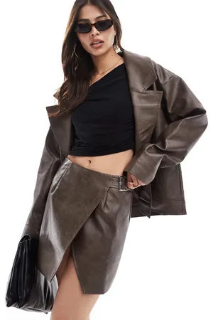 SNDYS Leather look wrap buckle side mini skirt co-ord in washed