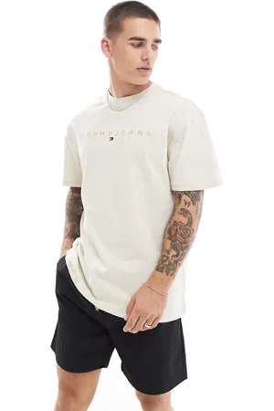Tommy Hilfiger Gold linear logo t-shirt in off white