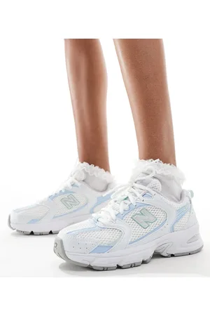 New Balance 530 trainers in and light blue
