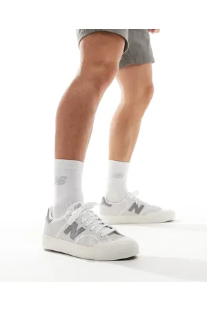 New Balance 100 trainers in and grey