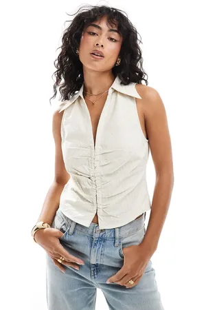 MANGO Clasp front sleeveless waistcoat in light beige