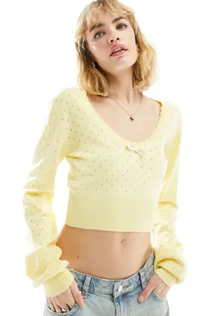 ASOS Knitted long sleeve top in pointelle stitch with contrast bow detail in lemon