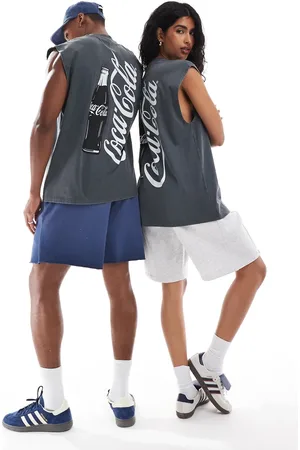 ASOS Unisex oversized license vest with Coca Cola logo in washed