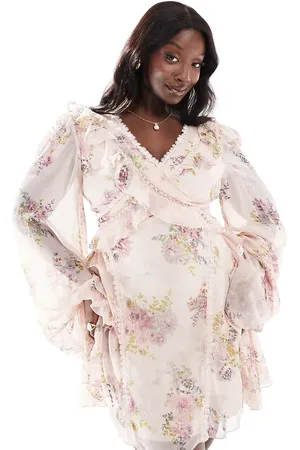 ASOS ASOS DESIGN Curve long sleeve lace insert ruffle mini dress with cut out in blush floral print