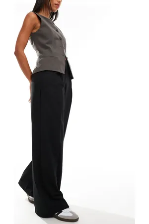 MANGO Slouchy mid waist trousers in