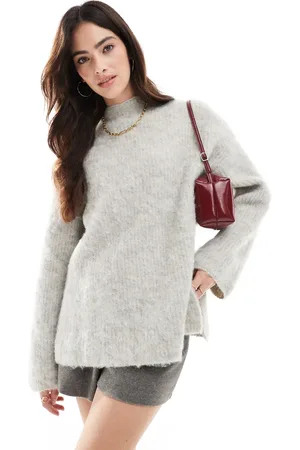 Pieces® Premium longline fluffy knit jumper with wide cuffs in light melange