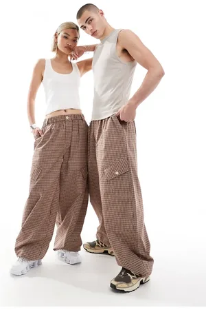 COLLUSION Unisex baggy trousers in check print
