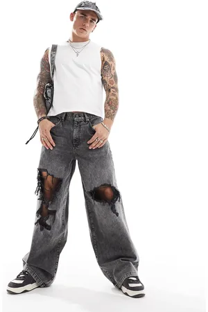 ASOS Super baggy jeans in washed with heavy rips