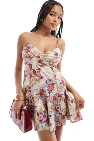 Miss Selfridge Satin godet hem mini slip dress in mixed animal floral print