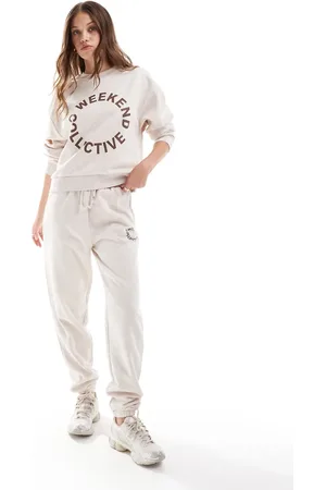 ASOS Weekend Collective co-ord jogger with brown round logo in oatmeal