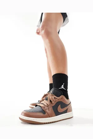 Jordan Air 1 low trainers in and black