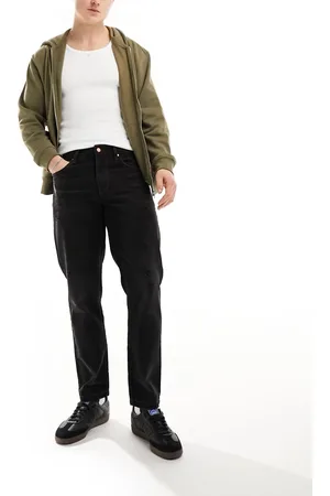 ASOS Tapered fit jeans with abrasions in washed