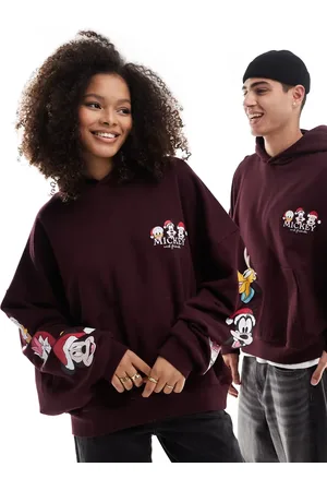 ASOS Disney unisex boxy oversized hoodie with Mickey Mouse and Friends Santa hat prints in