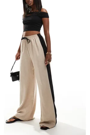 Reclaimed Wide leg tailored trouser with side stripe in