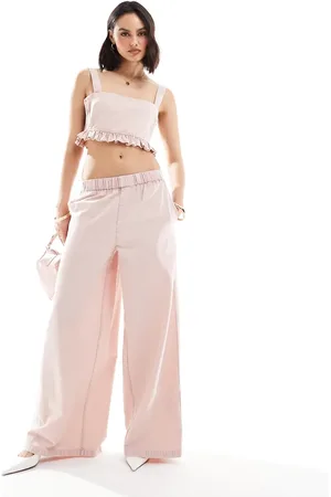 ASOS Wide leg pull on trousers with button detail in washed