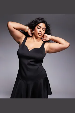 ASOS ASOS DESIGN Curve structured sweetheart neckline mini dress with peplum hem in