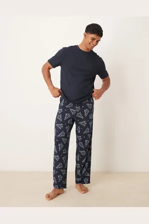 Urban Threads Poly Christmas t-shirt and trouser set in blue christmas tree print