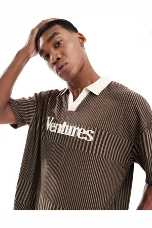 ASOS Oversized short sleeve polo with chest applique print in brown in rib