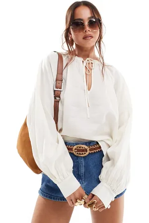 & OTHER STORIES Textured blouse with volumes sleeves and bow tie neck detail in off