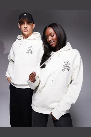 ASOS Disney unisex oversized hoodie with Mickey Mouse prints in beige