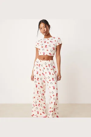 Urban Threads Petite poly t-shirt and trouser pyjama set in cowboy boot print