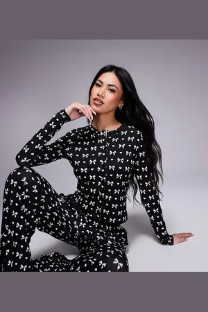 Kaiia Exclusive cropped button through pyjama shirt co-ord in black & white bow print