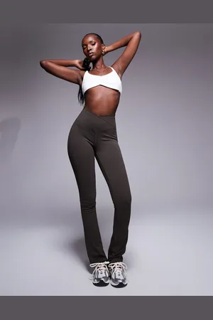 The Couture Club Sculpting stretch emblem flare leggings in chocolate