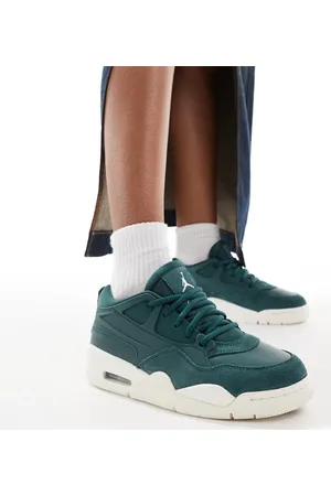 Jordan Air 4 RM trainers in off and green