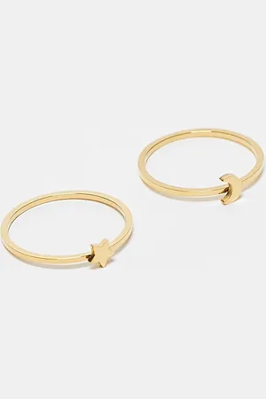 ASOS ASOS DESIGN Curve waterproof stainless steel pack of 2 rings with star and moon in tone with gift bag
