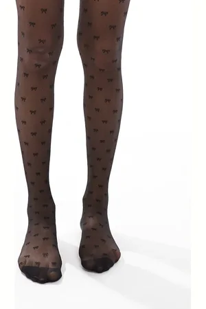 Pretty Polly All over bow pattern tights in