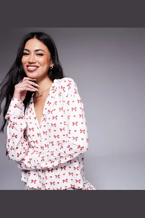 Kaiia Exclusive cropped button through pyjama shirt co-ord in red bow print