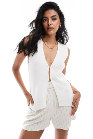 ASOS Fluffy knit waistcoat in ivory