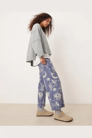 Free People Cowboy print low rise wide leg trousers in indigo