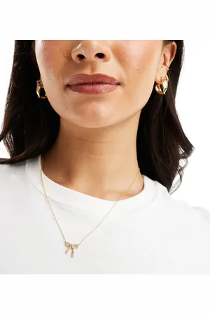 Accessorize Z Collection crystal bow pendant necklace in plated