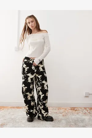 COLLUSION Baggy trousers in cow print