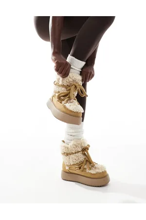 ASOS Alpine shearling lace up snow boots in beige
