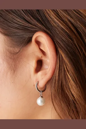 LOST SOULS Stainless steel huggie hoop earrings with pearl charm in