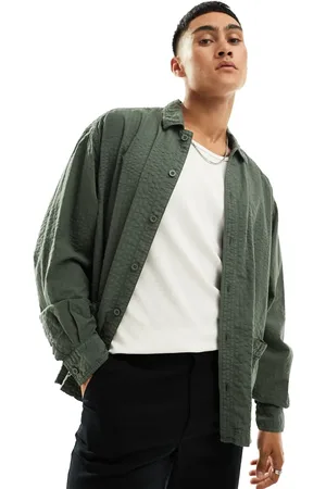 ASOS Boxy overshirt with pockets in khaki