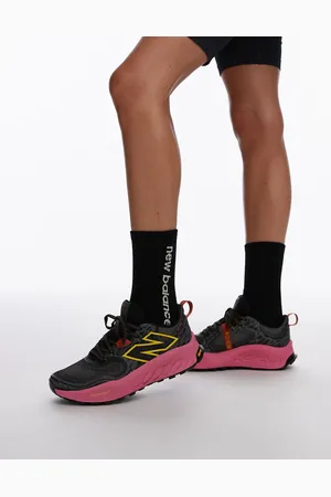 New Balance Hierro trail running trainers in and pink