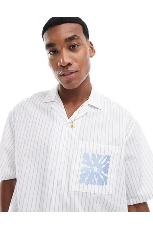 ASOS Oversized boxy shirt with embroidered pocket in stripe