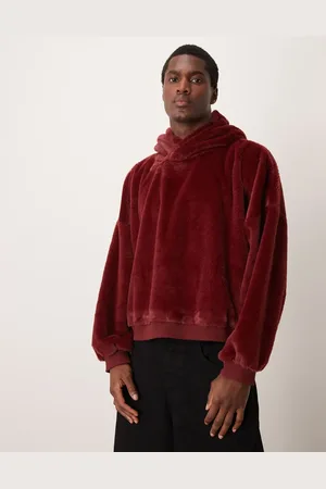 ASOS Extreme oversized cropped fur hoodie in burgundy