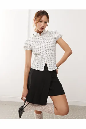 Motel Polka dot fitted blouse in