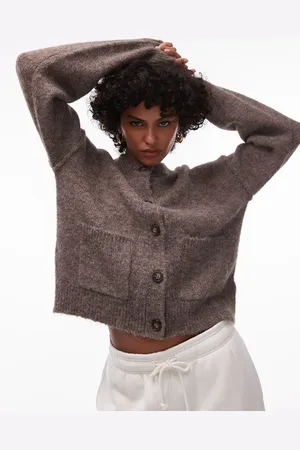 Topshop Knitted oversized exposed seam crew cardi with pockets in