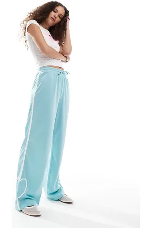 Monki Heart stripe straight leg track pant trouser in light with white stripes