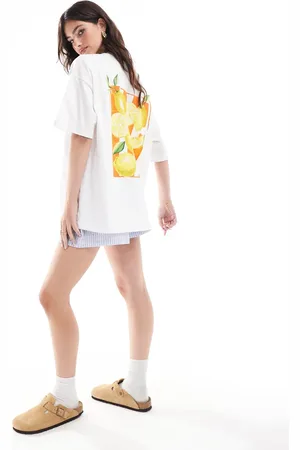 ASOS Oversized t-shirt with painted citrus fruit graphic in lemon