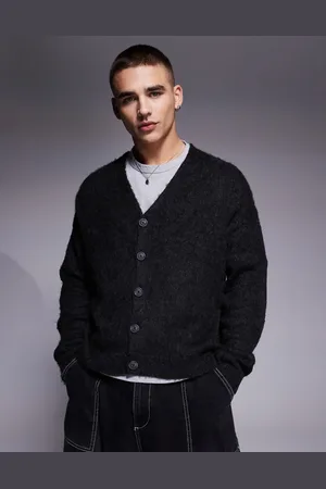 ASOS Relaxed boxy fluffy knitted cardigan in black marl